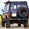 Paragolpes trasero Toyota Land Cruiser 77